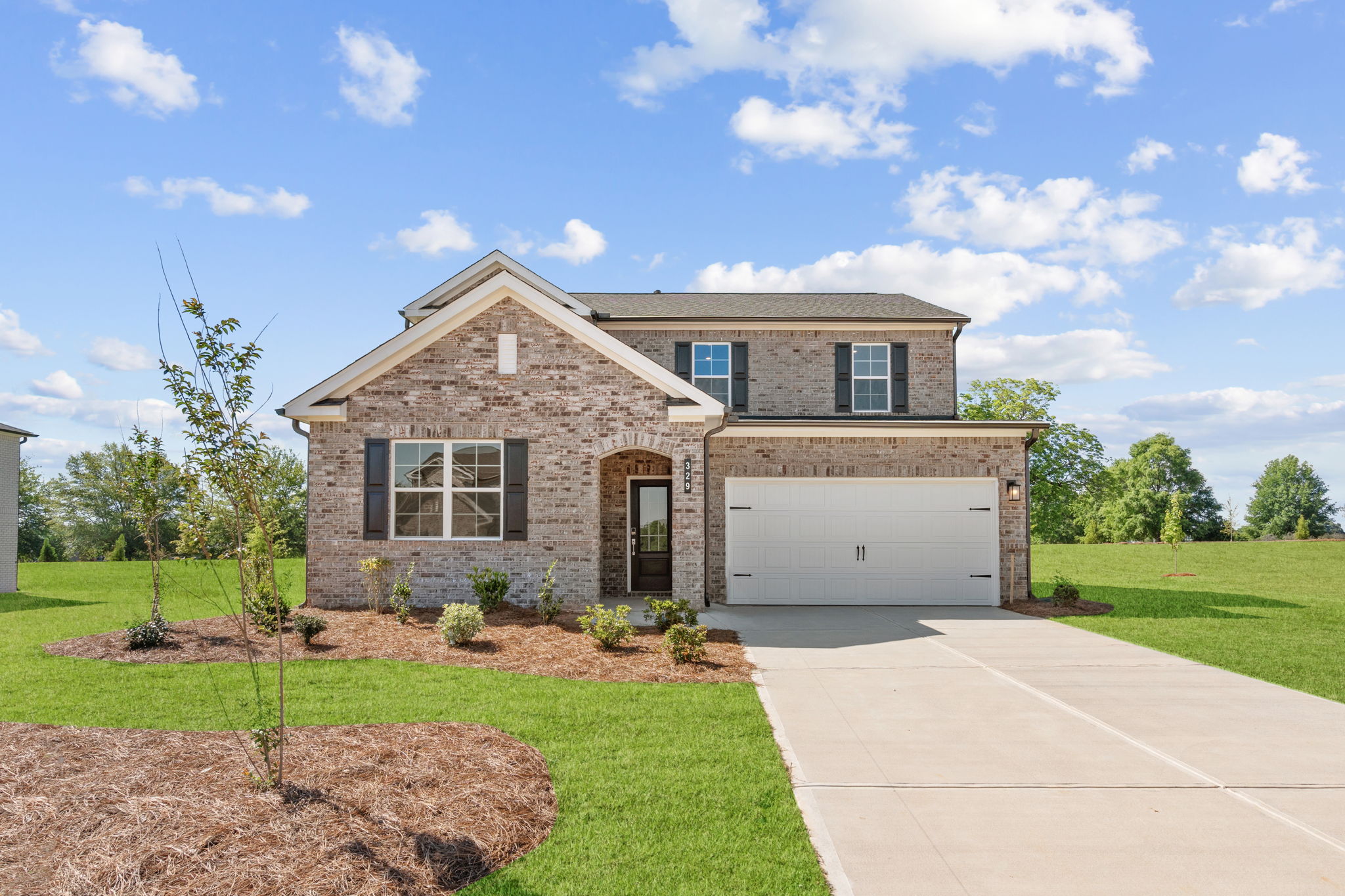 A house with a driveway.