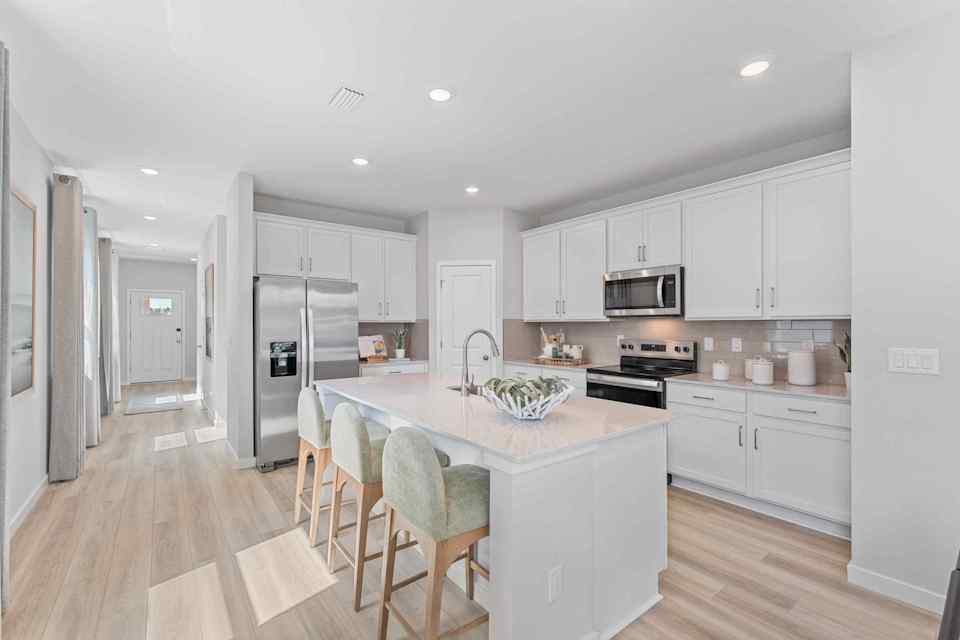 Laurel II Model Home Kitchen with Island at Camden Woods in Kingsland, GA