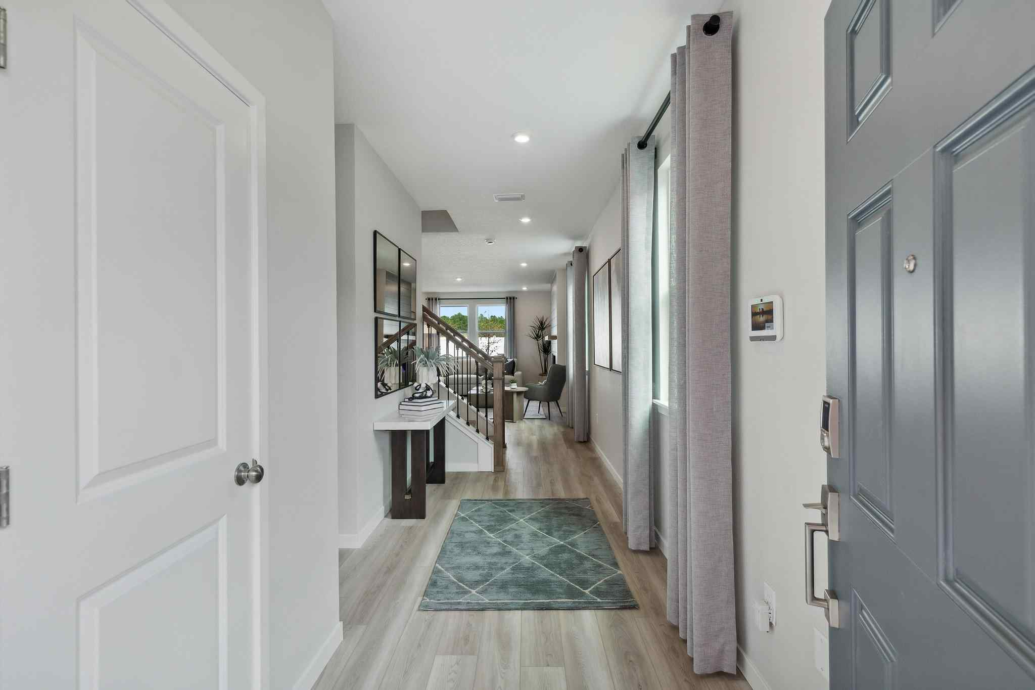 A hallway with white doors.