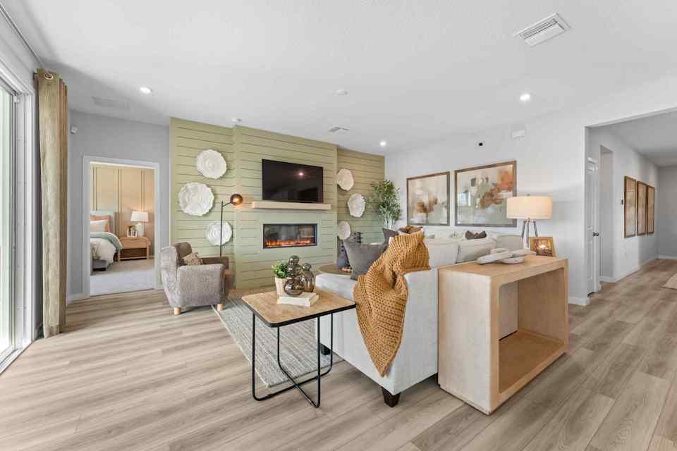 A living room with a fireplace.