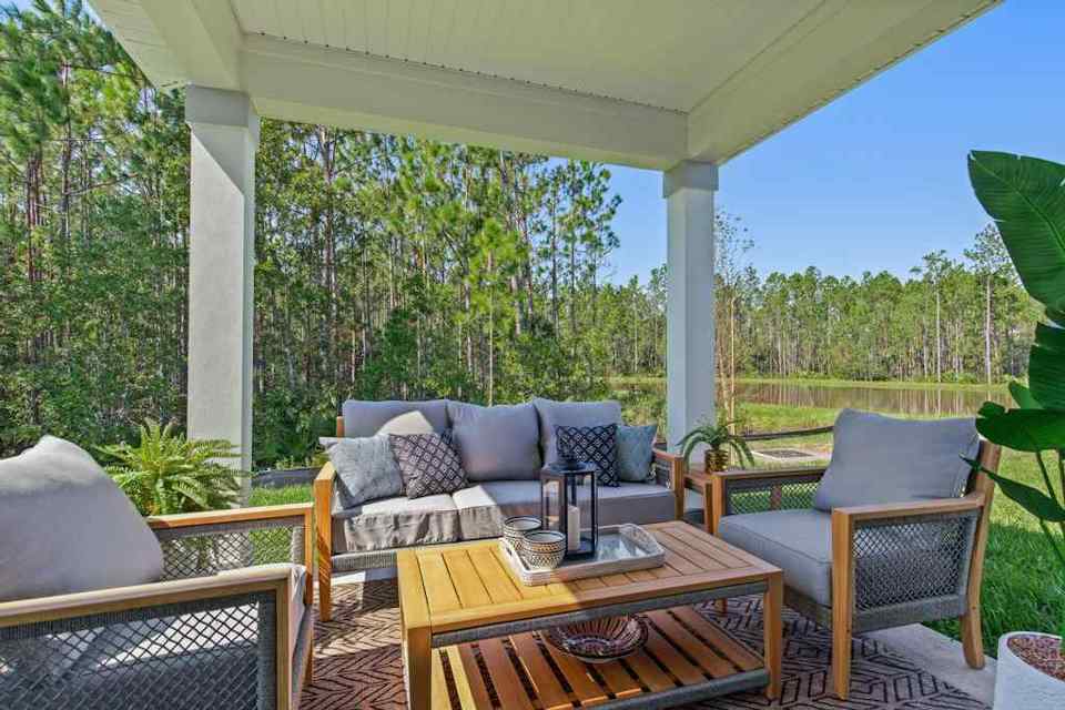 A living room with a covered patio.