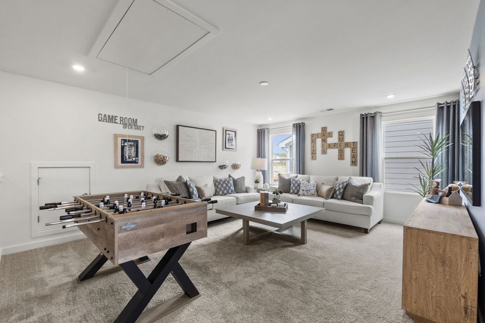 A living room with a couch and coffee table.