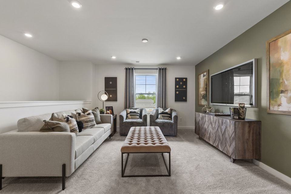 A living room with a couch and a coffee table.