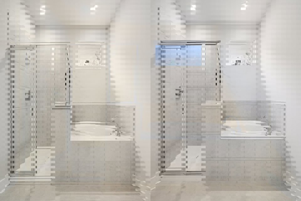 A bathroom with a glass shower.