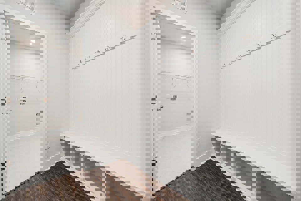 A white room with a white wall.