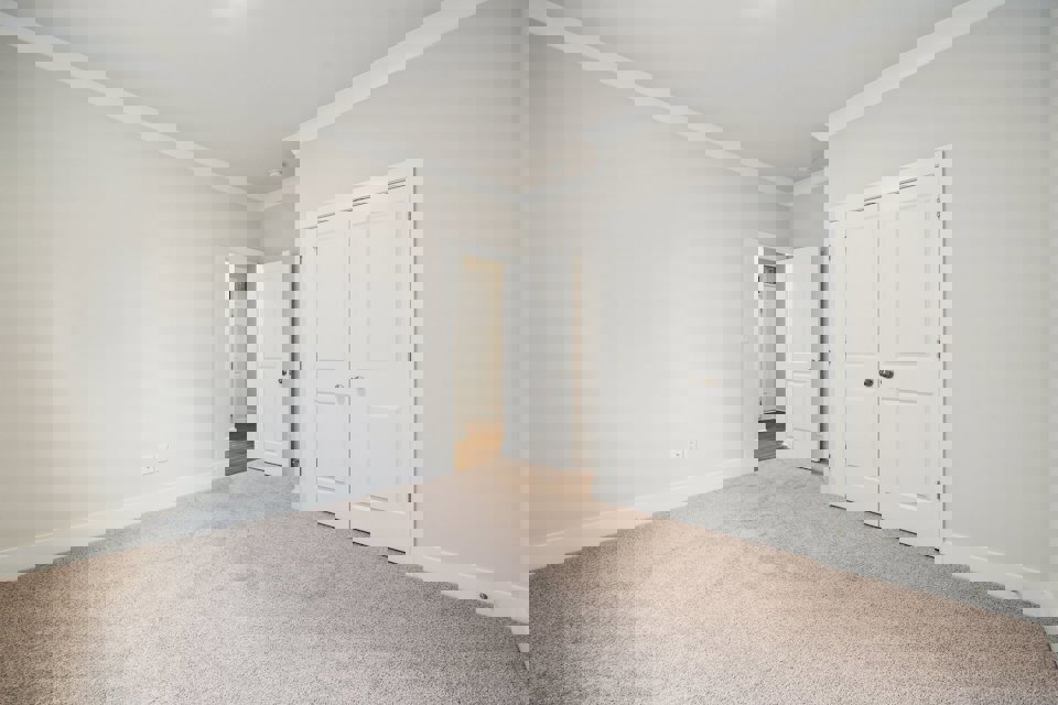 A room with white doors.