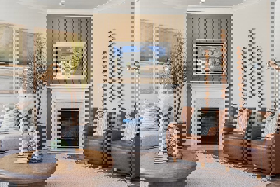 A living room with a fireplace.