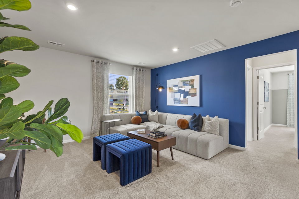 A living room with a couch and a coffee table.