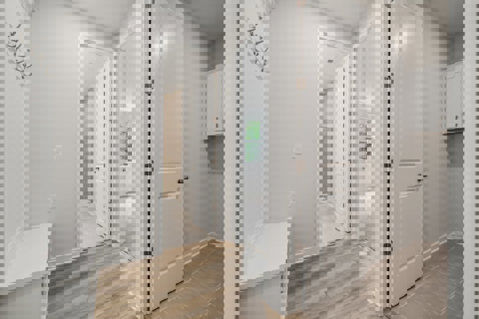 A room with white doors.