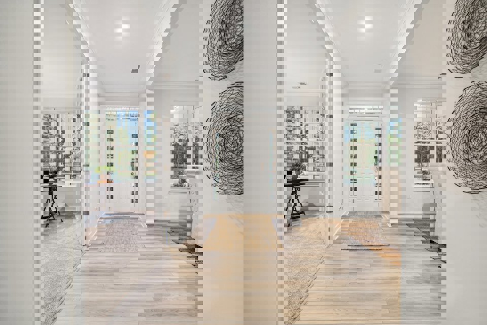 A room with a wood floor and a wood floor.