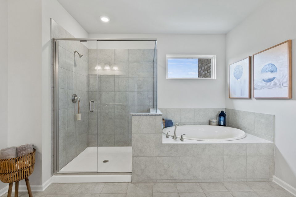 A bathroom with a glass shower.