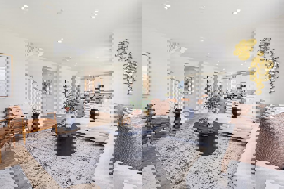 A living room with a couch and a coffee table.