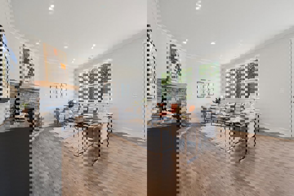 A living room with a fireplace.