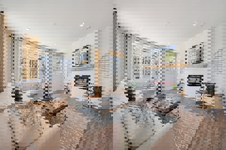 A living room with a fireplace.