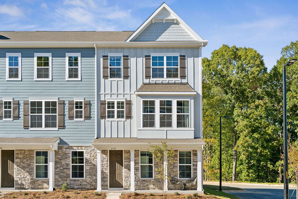 A large building with trees in front of it.