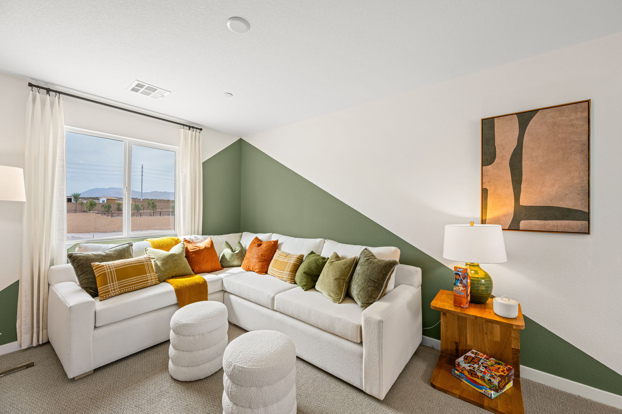 A living room with a couch and a coffee table.