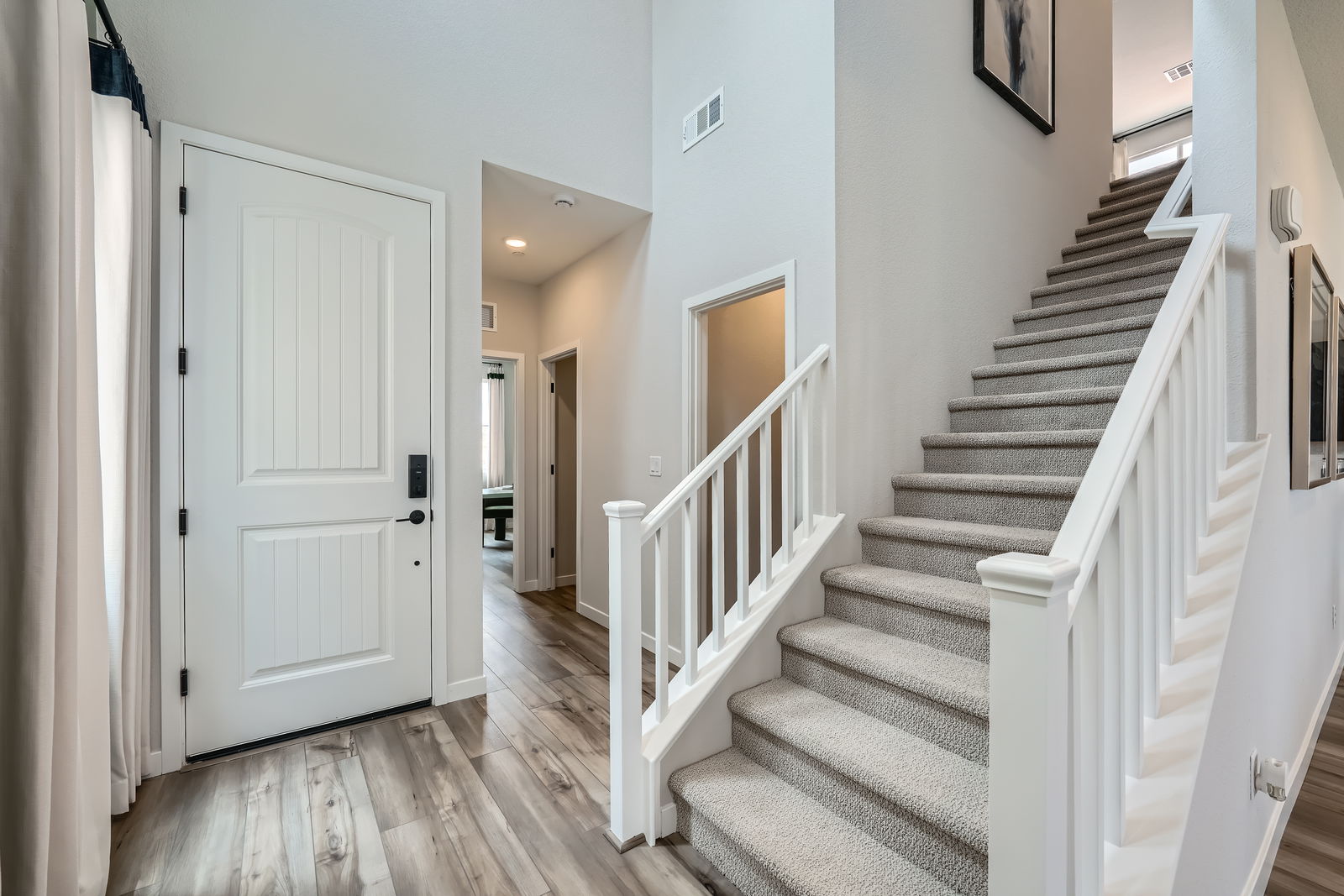 A staircase leading to a door.