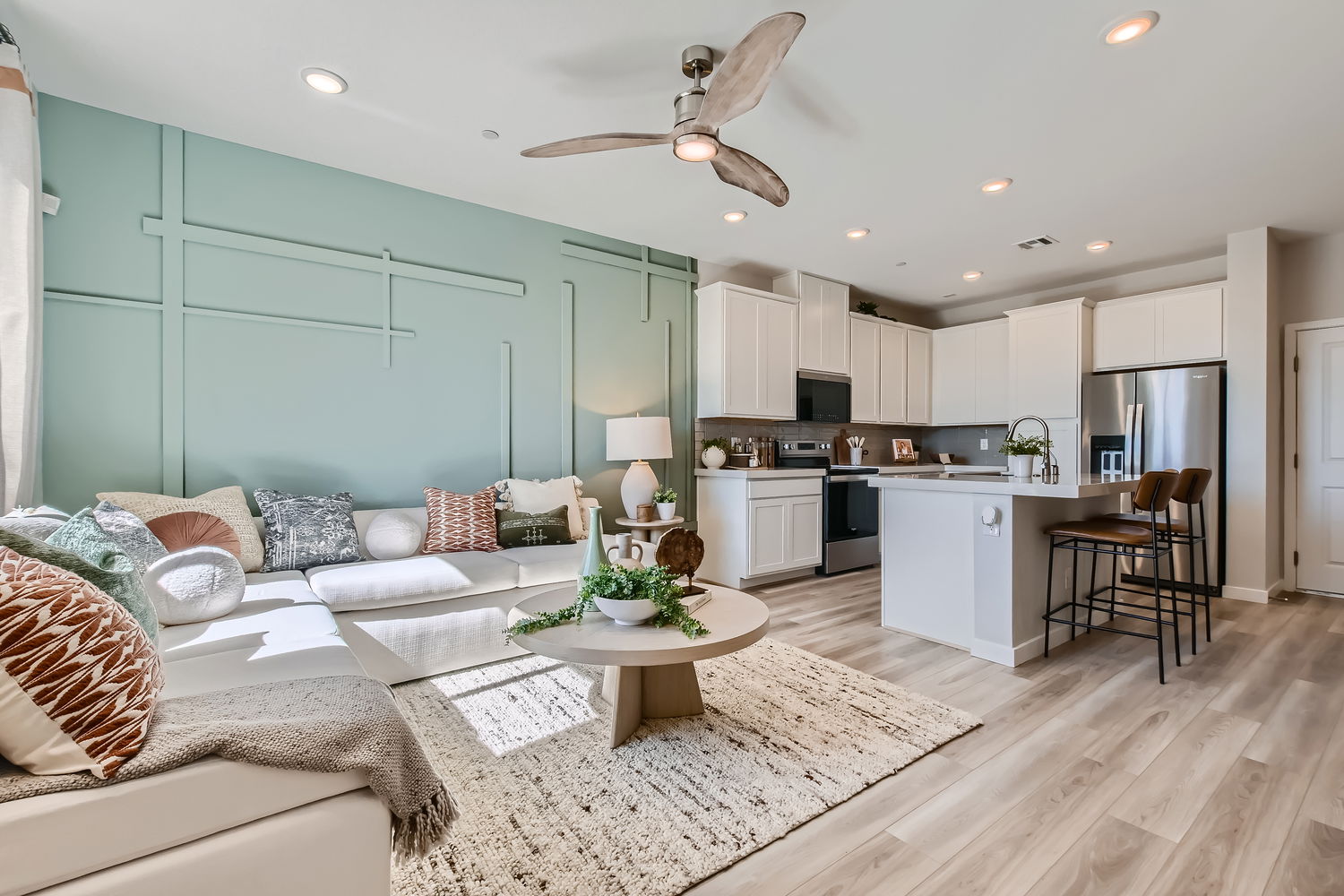 A living room with a couch and a table.