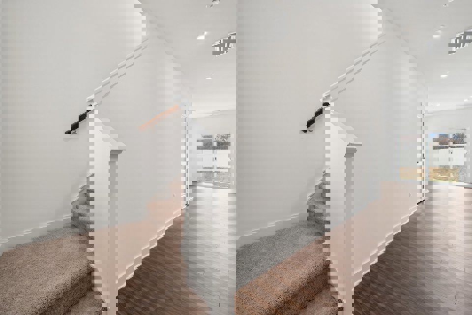 A white staircase in a house.