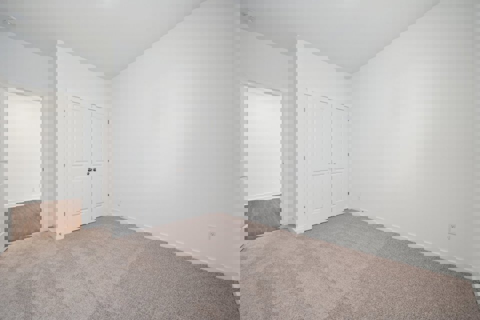 A room with white doors.