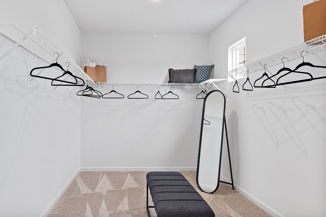 A room with a bed and a couch.