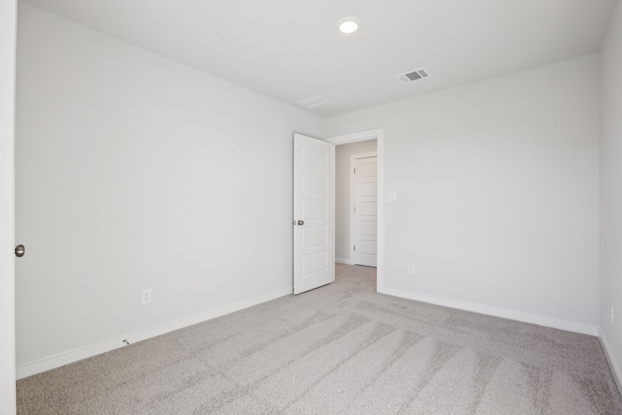 A room with white doors.