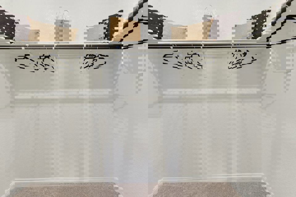 A white table with glasses.