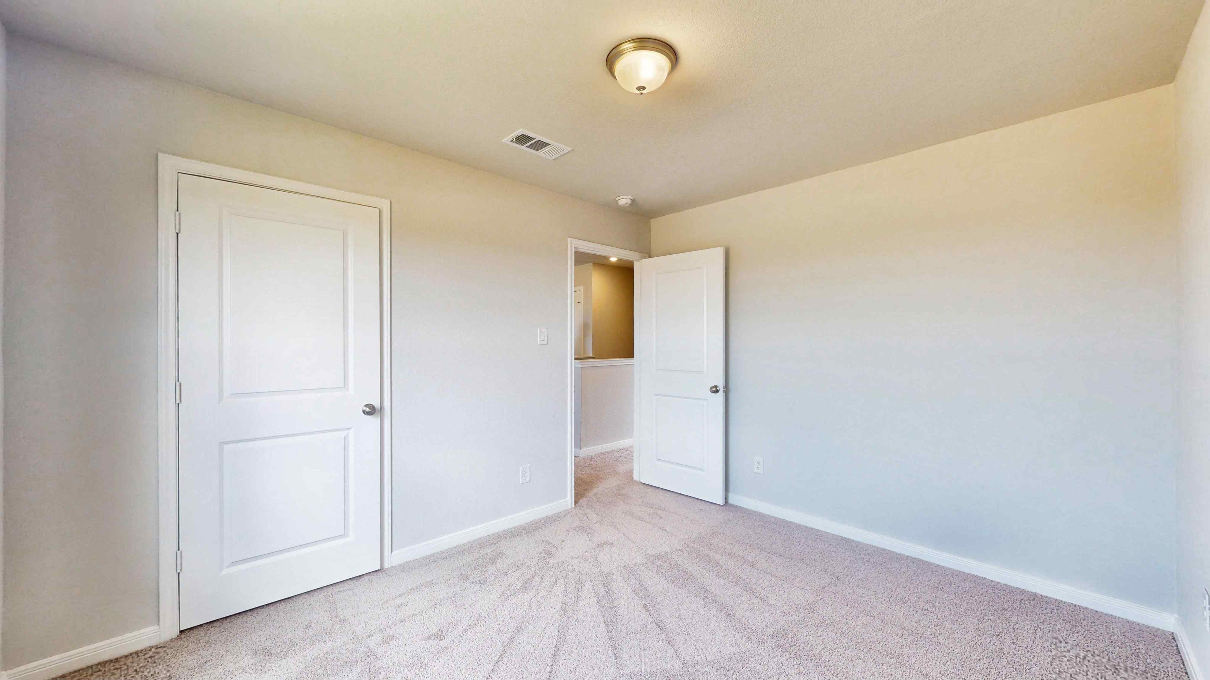 A room with white doors.