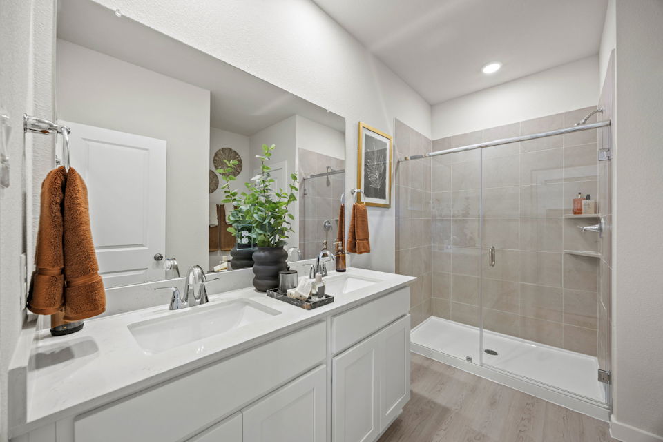 A bathroom with a glass shower.