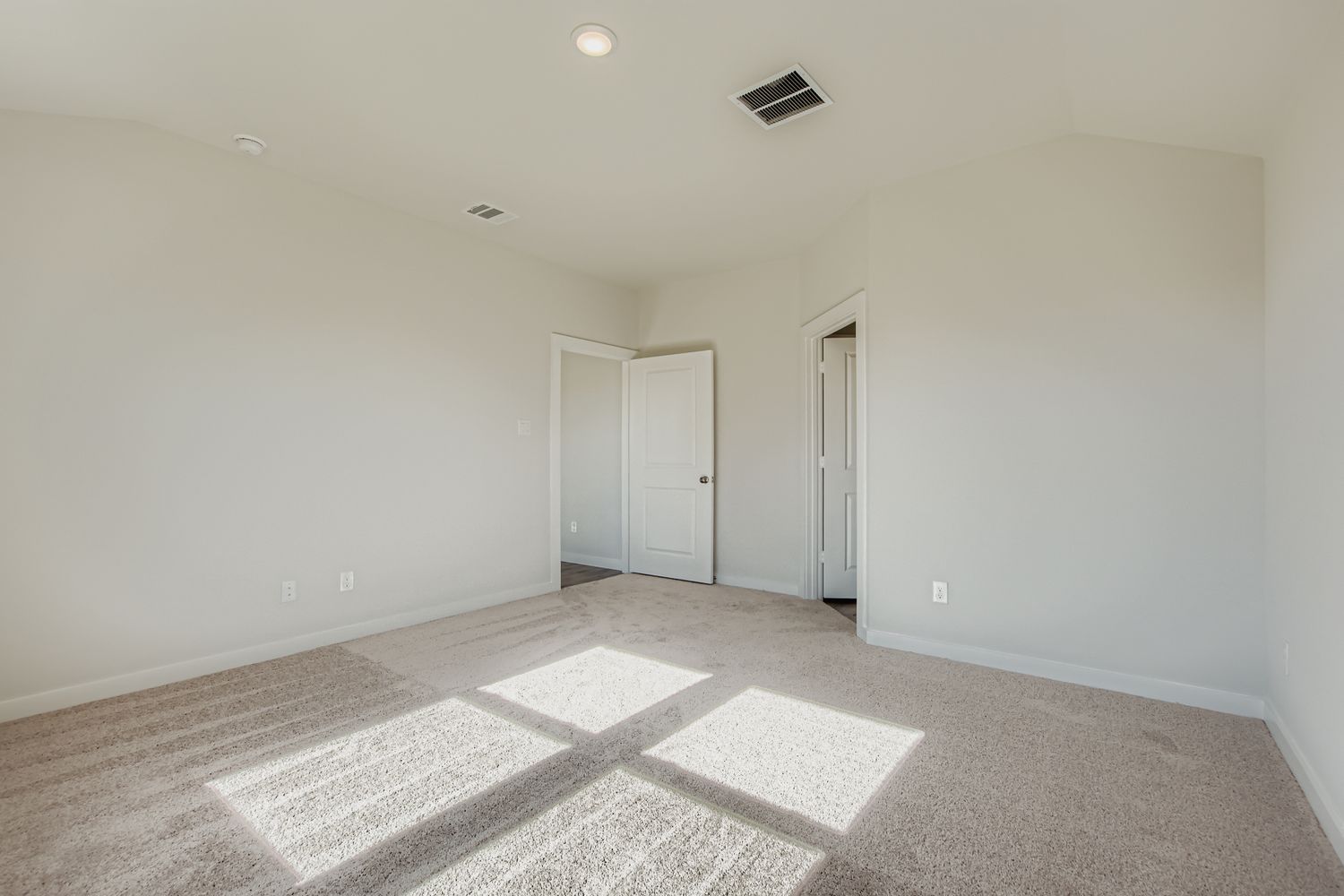 A room with white doors.