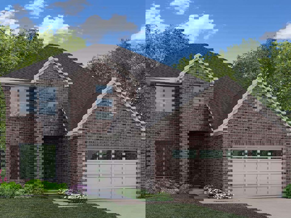 A brick house with a garage with Eudora Welty House in the background.