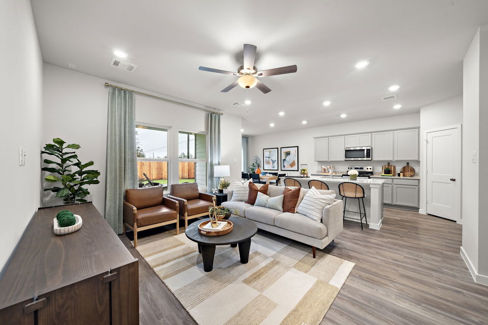 A living room with a large window.
