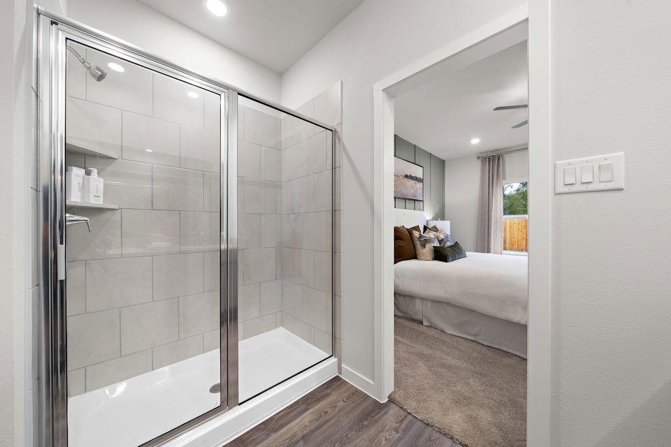 A bathroom with a glass shower.