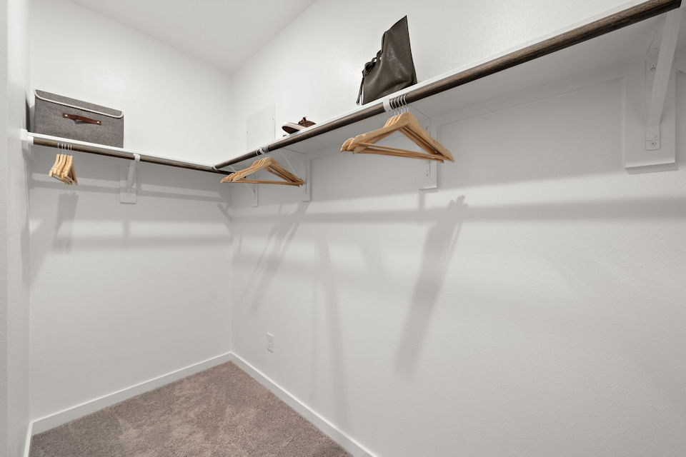 A staircase with a black cloth from the ceiling.