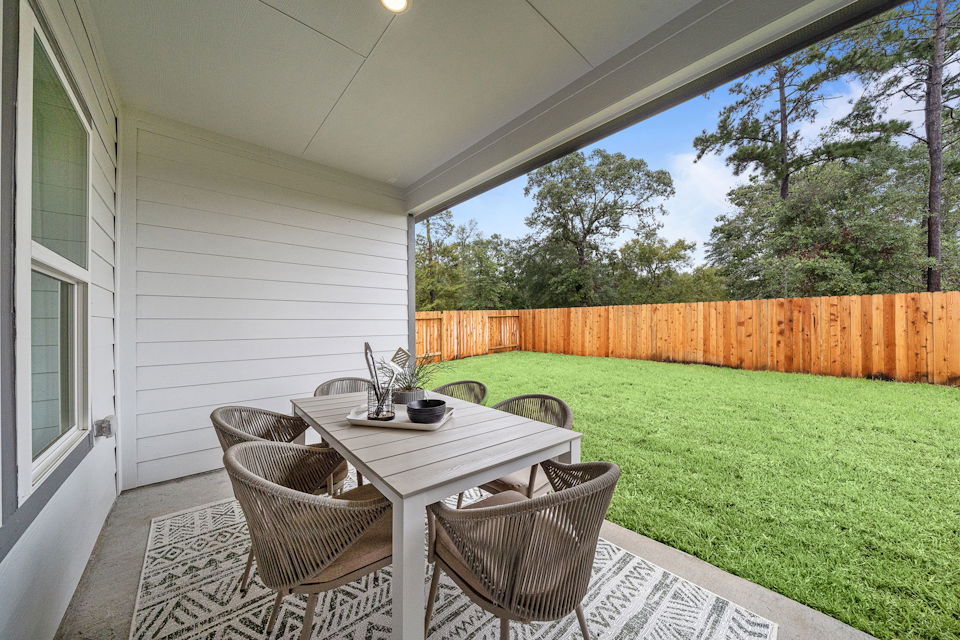 A table and chairs outside.