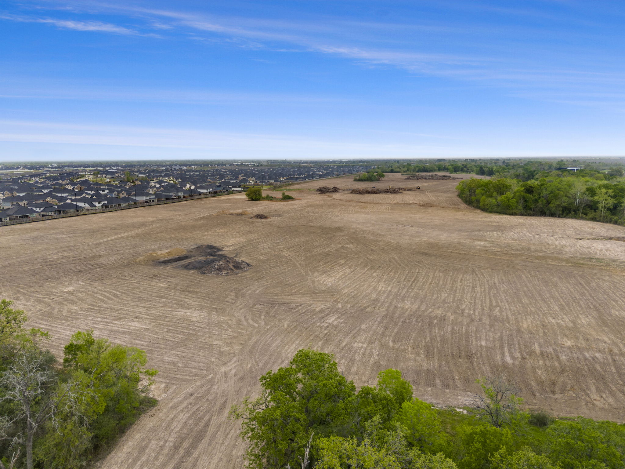 A landscape with trees and buildings.