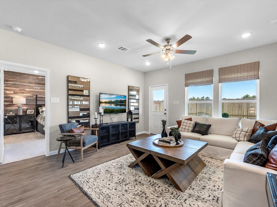 A living room with a large window.