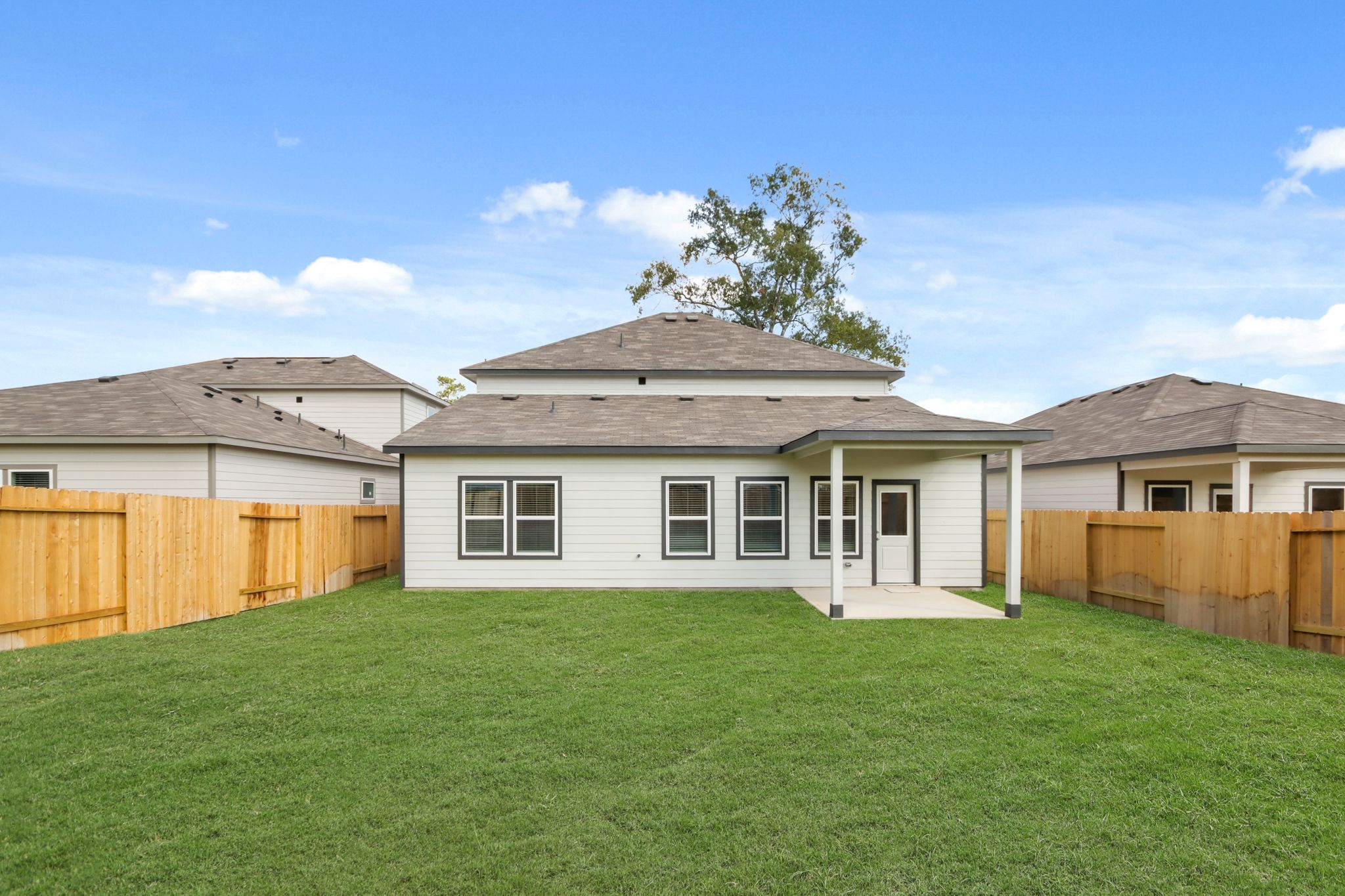 A house with a fence around it.