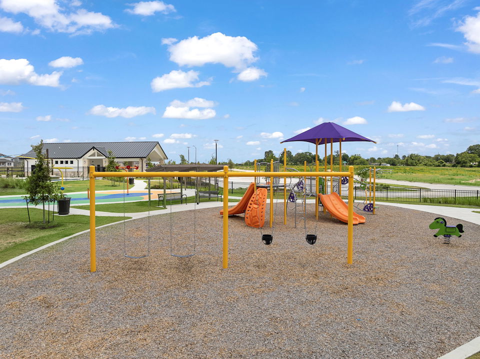 A playground with a slide and a slide.