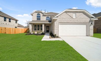 A house with a large front yard.