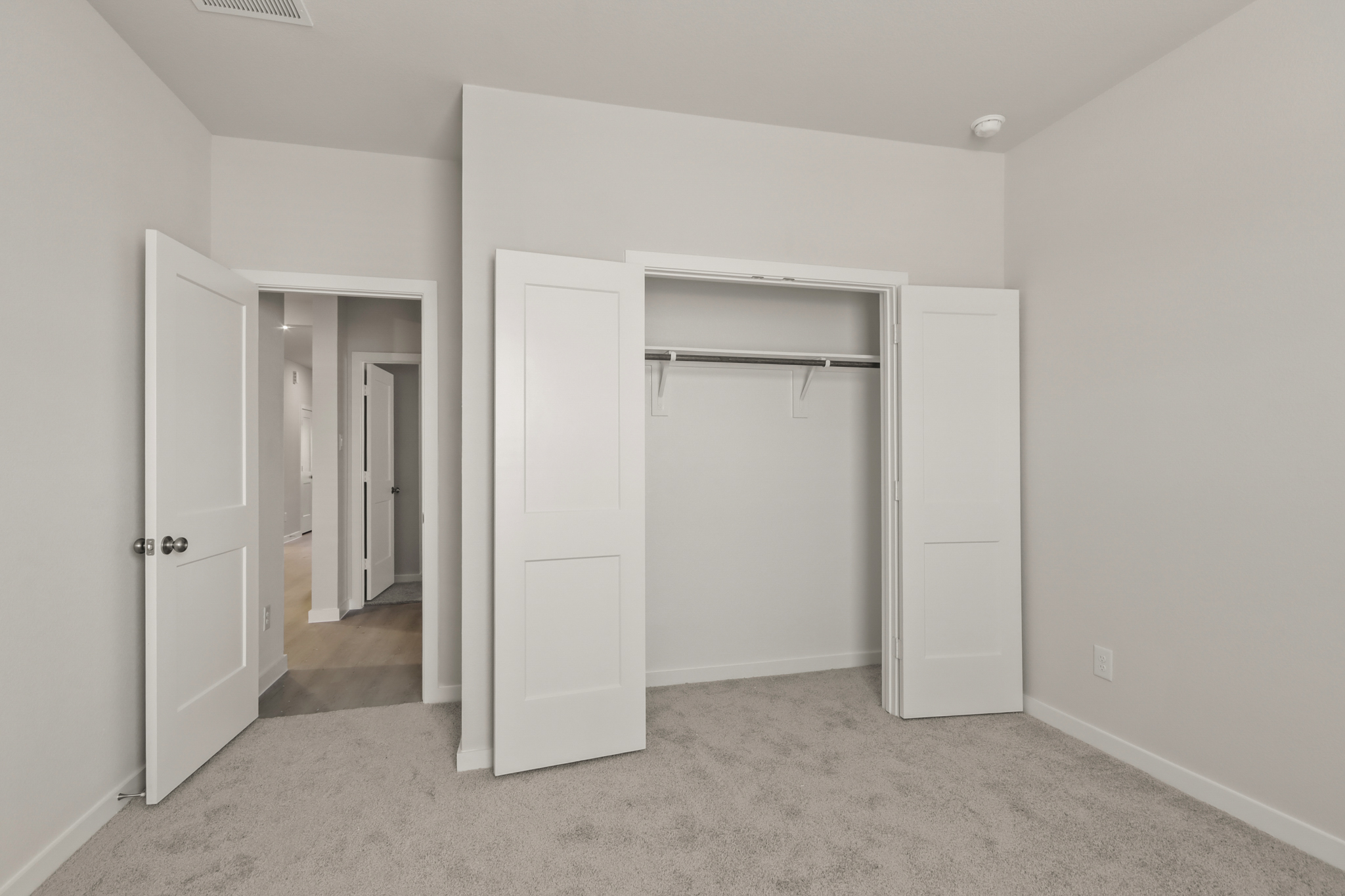 A room with white doors.