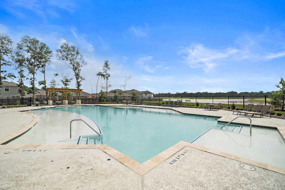 A swimming pool with a fence around it.