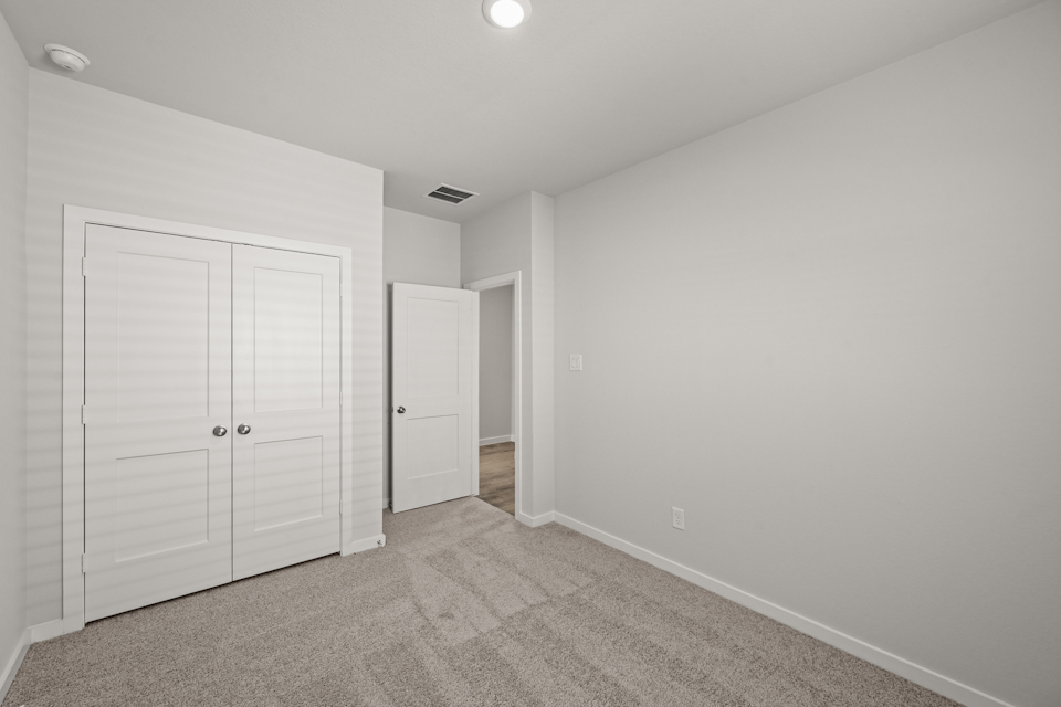 A room with white doors.