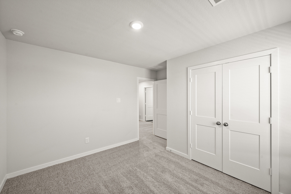 A room with white doors.