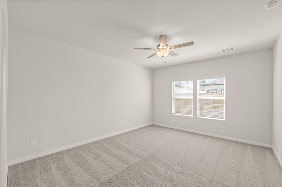 A ceiling fan in a room.
