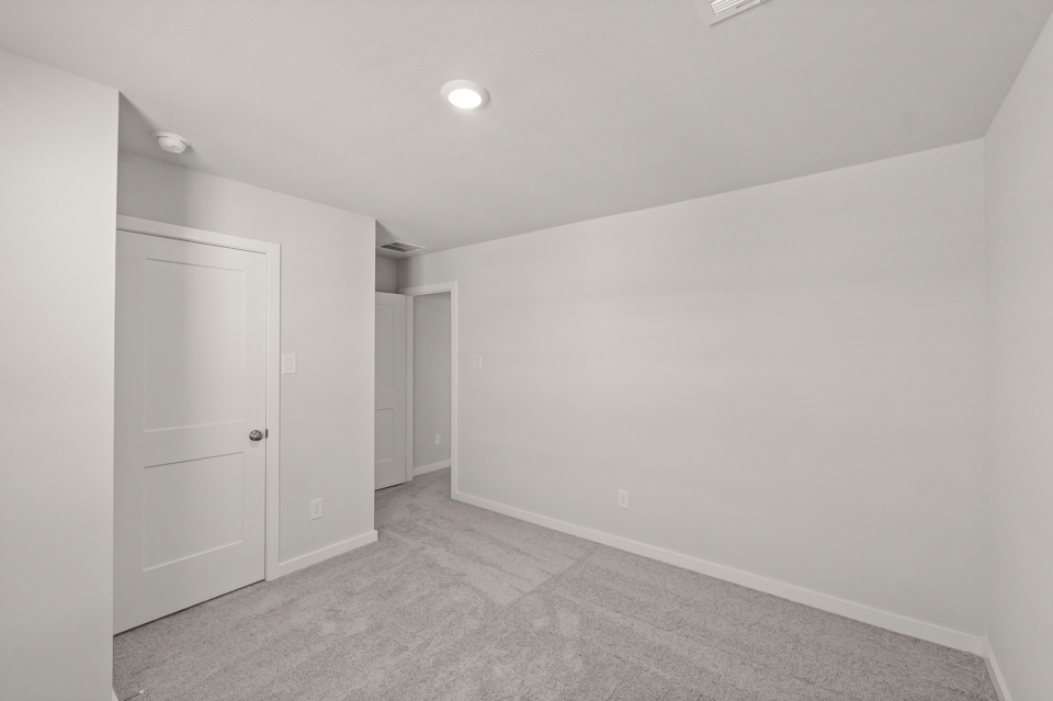 A room with white doors.