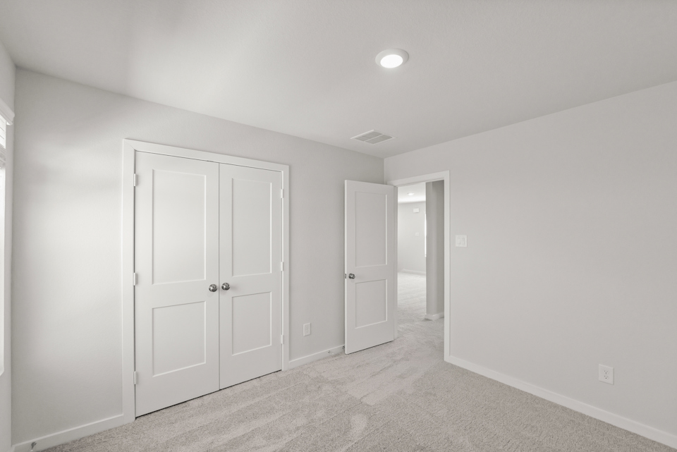 A room with white doors.