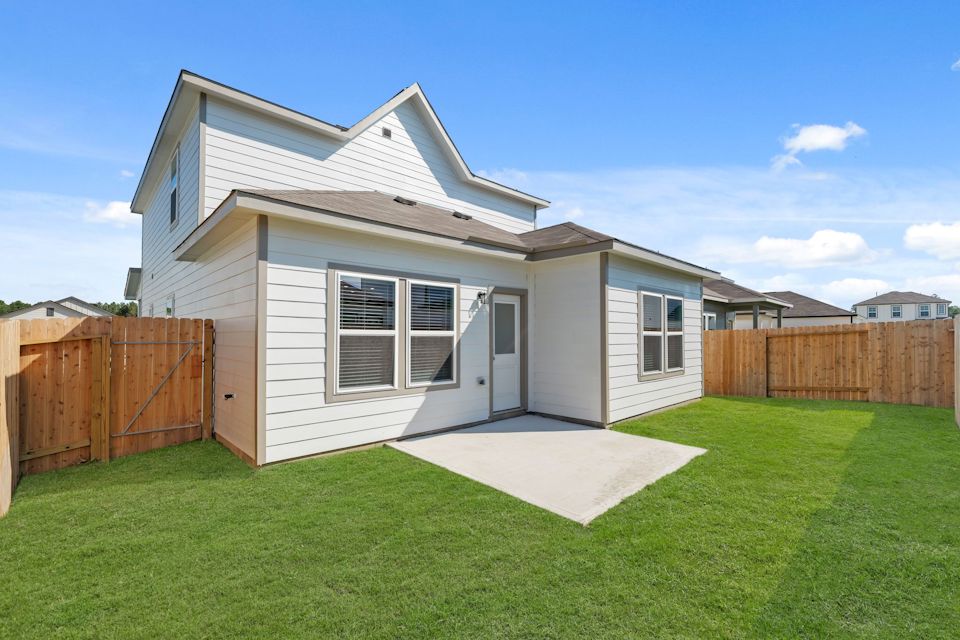 A house with a fence around it.