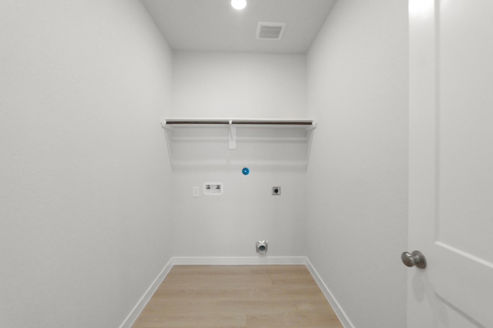 A room with a wood floor and a wood floor.