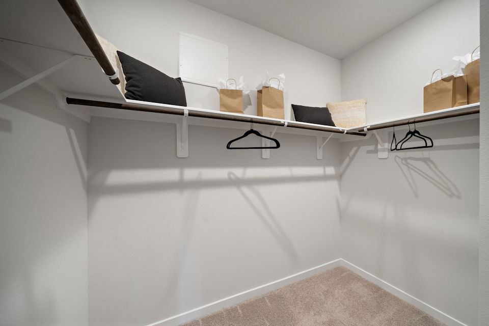 A bed with a white frame.